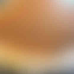 Cinnamon roll filling after being spread out on rolled out dough