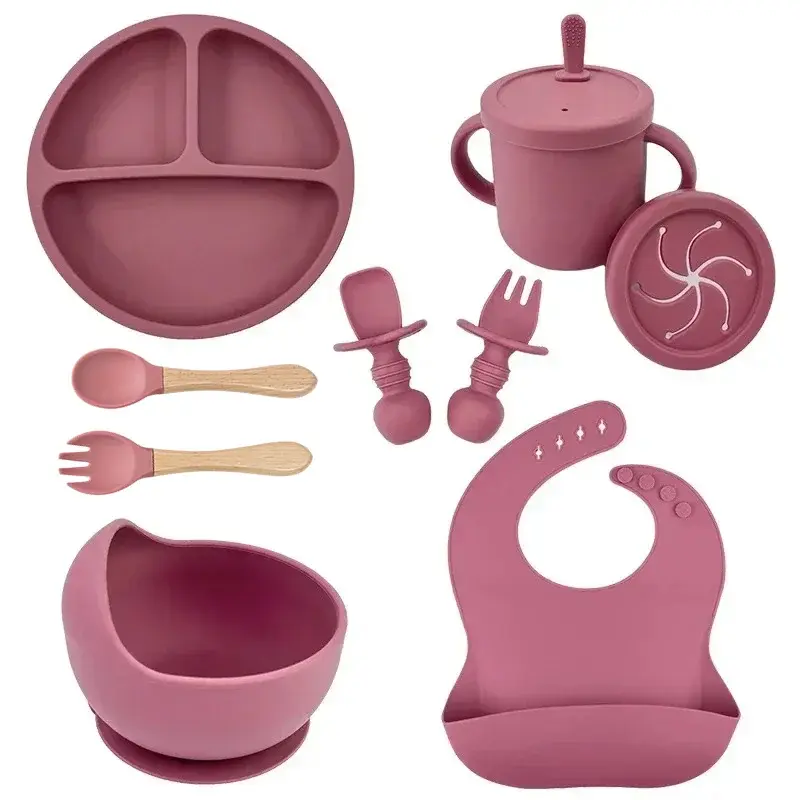 Norvani TinyFeast silicone feeding set: plate, bowl, cup, snack cup, spoons, forks, bib.