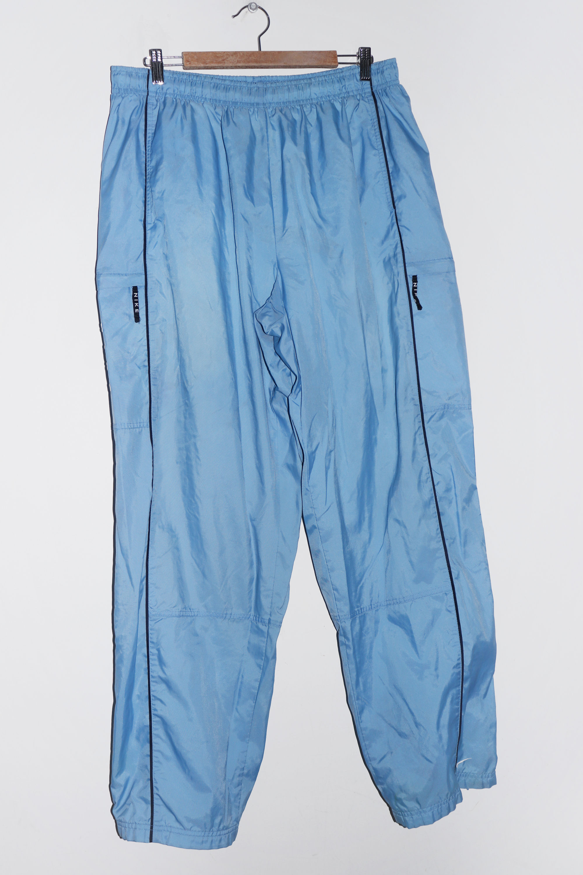 Vintage 90s Nike Embroidered Spellout Baggy Ice Blue Track Pants (38-42)