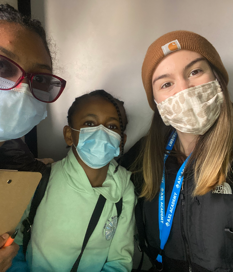 teacher and students wearing masks