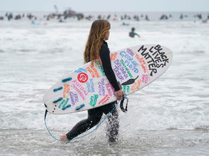 ‘Solidarity in Surfing’ by Black girls and supporters surf around the world