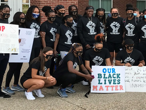 British women’s basketball team united for a social justice rally in university campus