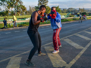Gym closures force sports champions to train by the roadside