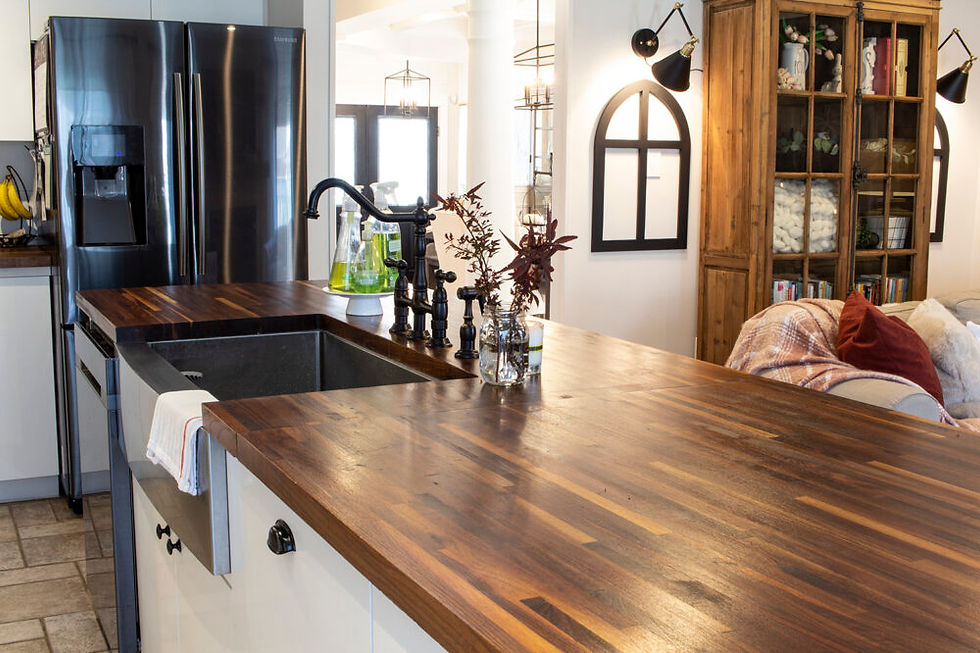 Butcher block countertop with warm farmhouse design in a Jacksonville custom home by Apex Homes Florida.