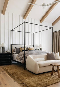 Craftsman-style master bedroom with detailed wood trim in the Bayfront Plan Jacksonville home.