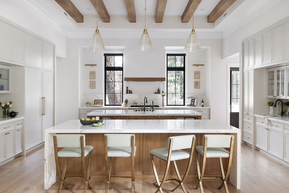 Luxury custom home kitchen with large island and natural light designed for long-term value