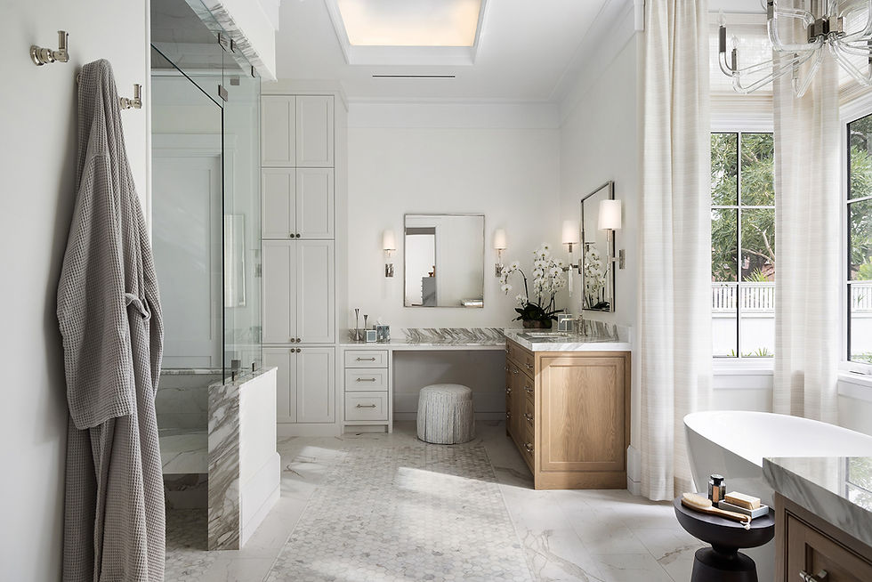Luxury primary bathroom with freestanding soaking tub and spa-style design in a custom home