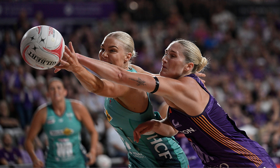 New Zealand's Kate Heffernan holding a netball