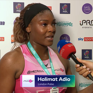 Halimat Adio being interviewed with a microphone