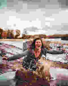 Steph jumping in a water puddle. This is my go for it attitude.