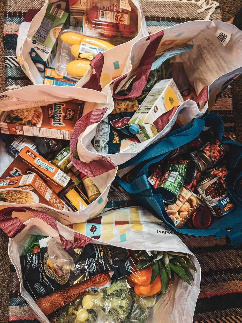 Buying groceries to prep crockpot freezer meals.
