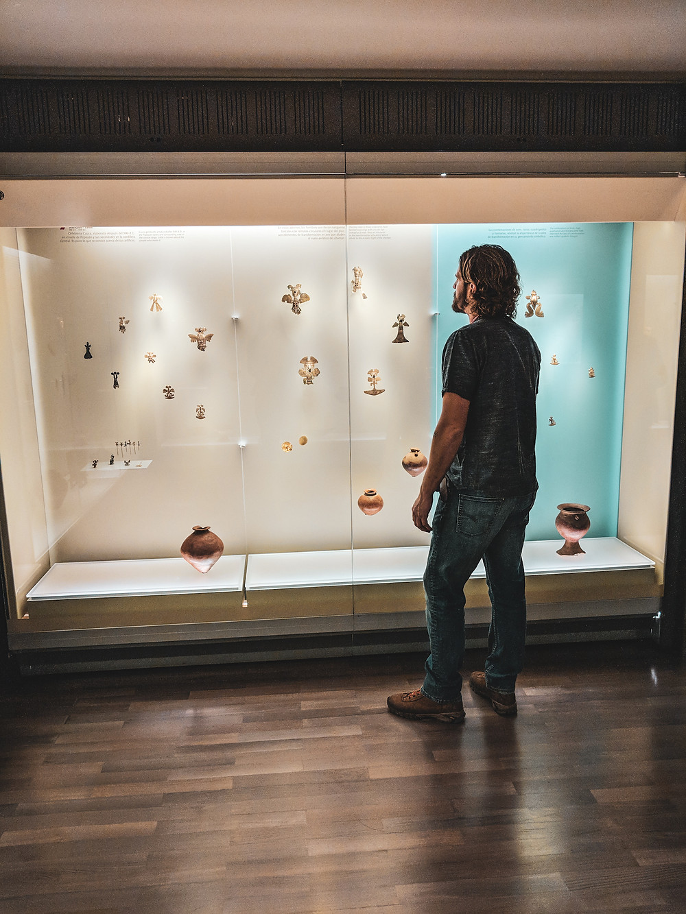 Scott admiring a display at El Museo de Oro, The Museum of Gold in Bogota, Colombia
