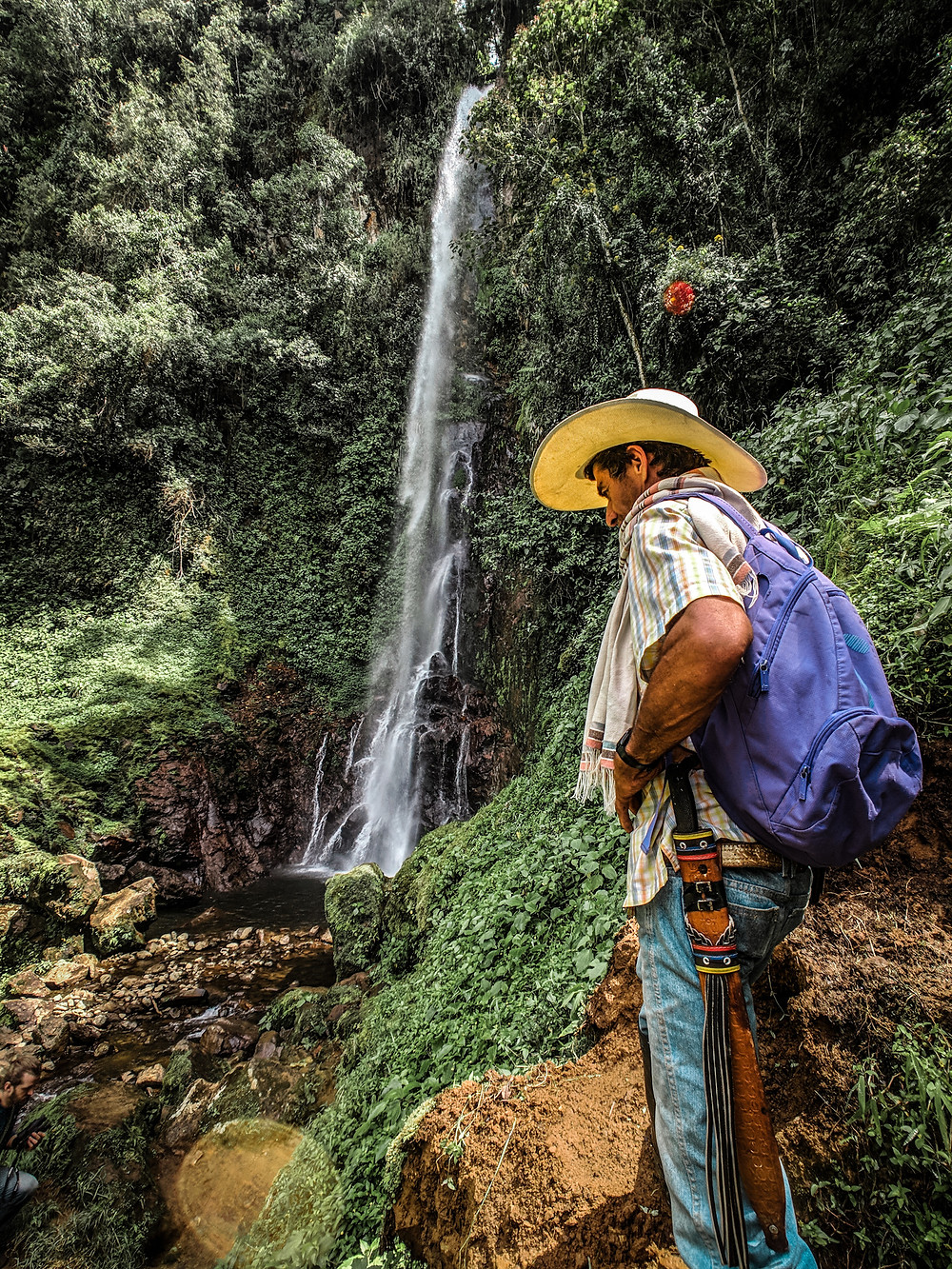 Watching climbers in Jardin, Colombia.