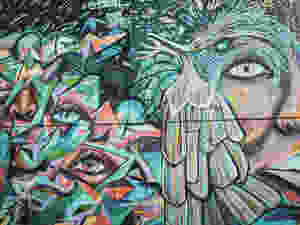Colorful graffiti mural in Comuna 13 in Medellín, Colombia.