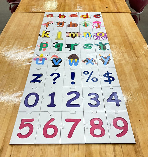 A colorful alphabet puzzle with a painted animal for each letter