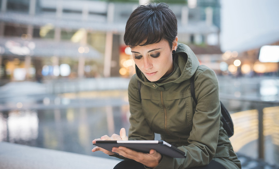 Young Woman Reading Tablet