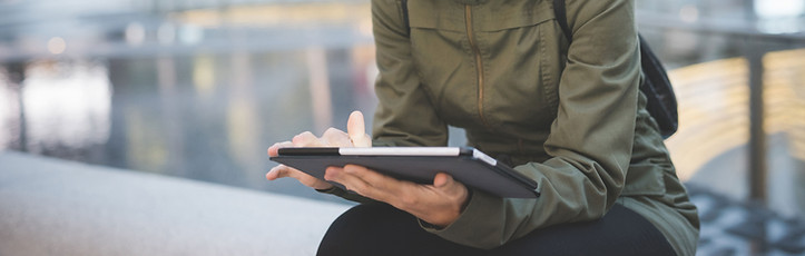 Young Woman Reading Tablet
