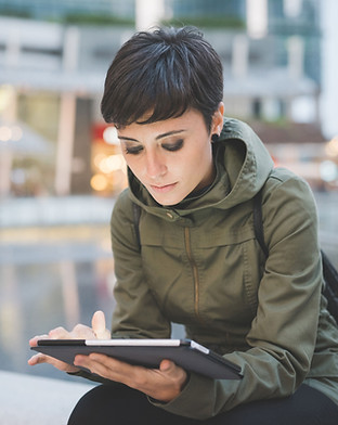 Young Woman Reading Tablet