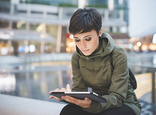 Young Woman Reading Tablet
