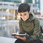 Young Woman Reading Tablet