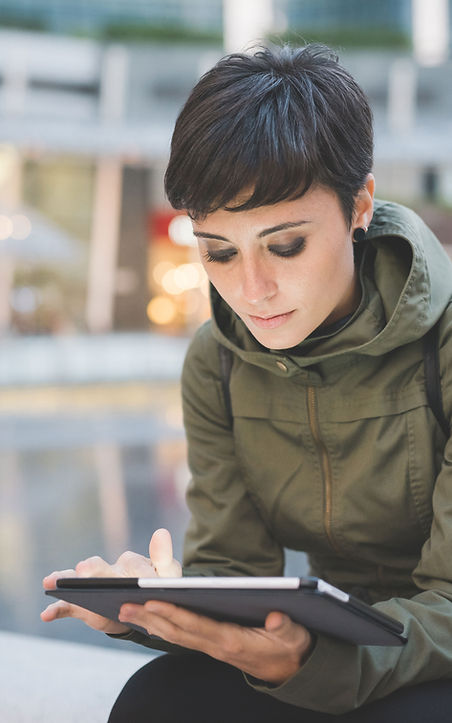 Young Woman Reading Tablet