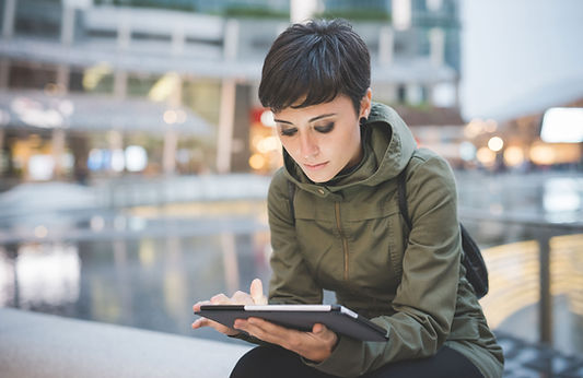 Young Woman Reading Tablet