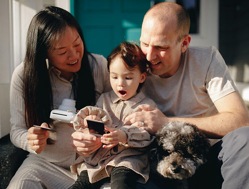 family of three sitting together