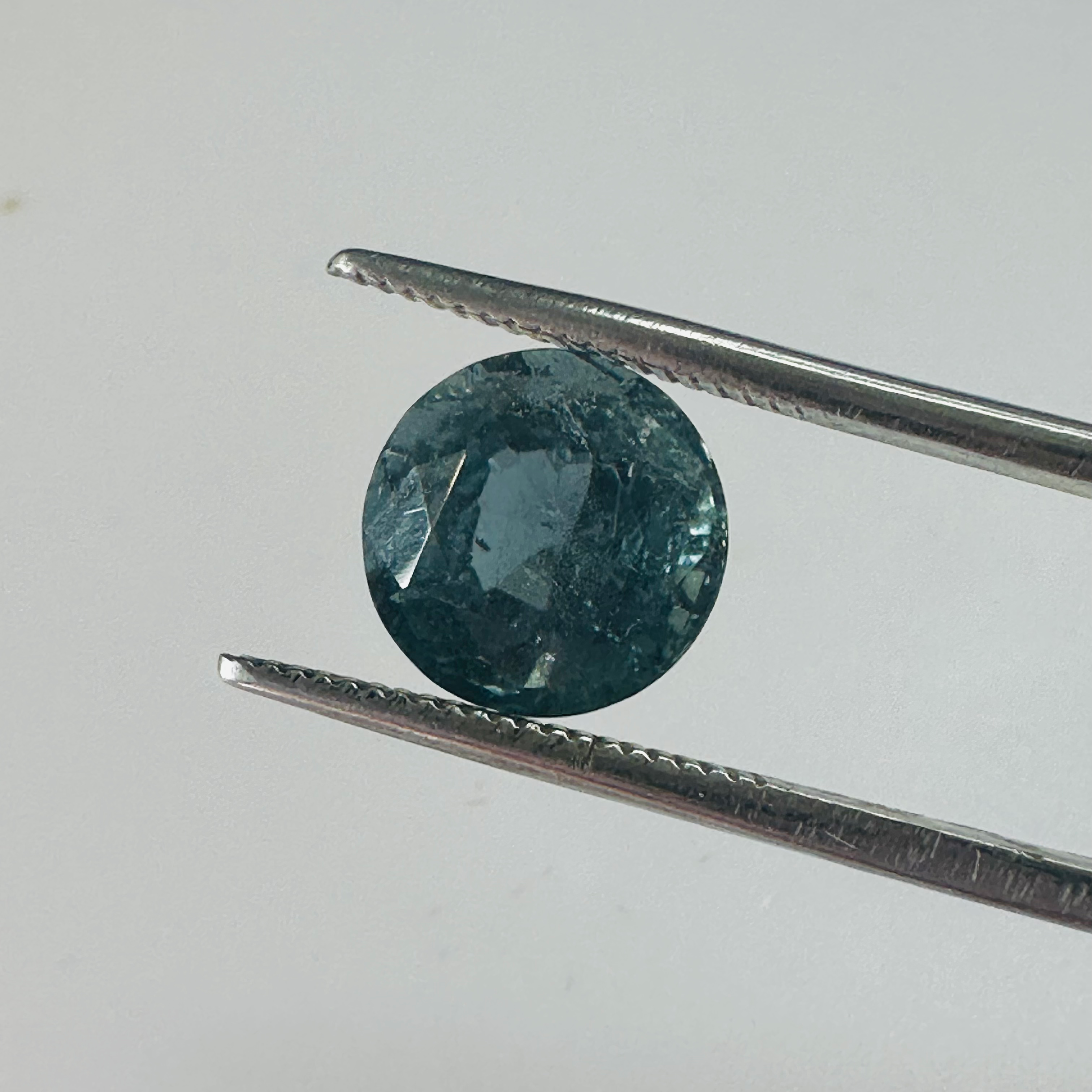 TOURMALINE BLUE ROUND 9MM.  2.96CTS