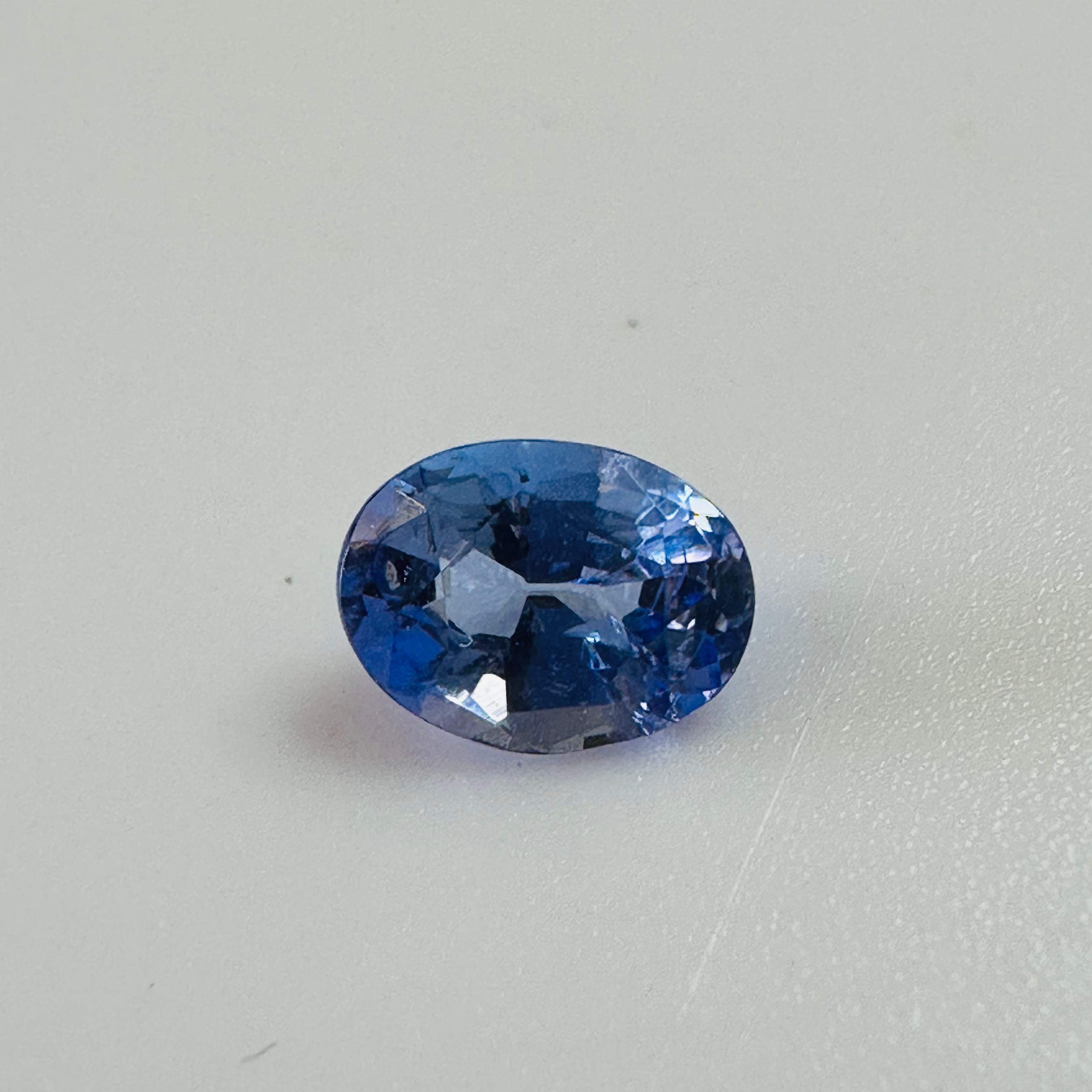 TANZANITE 0VAL 7MMX5.2MM  0.82CTS