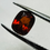 Thumbnail: Red Zircon cushion 7.4mm x 6mm.1.79cts natural