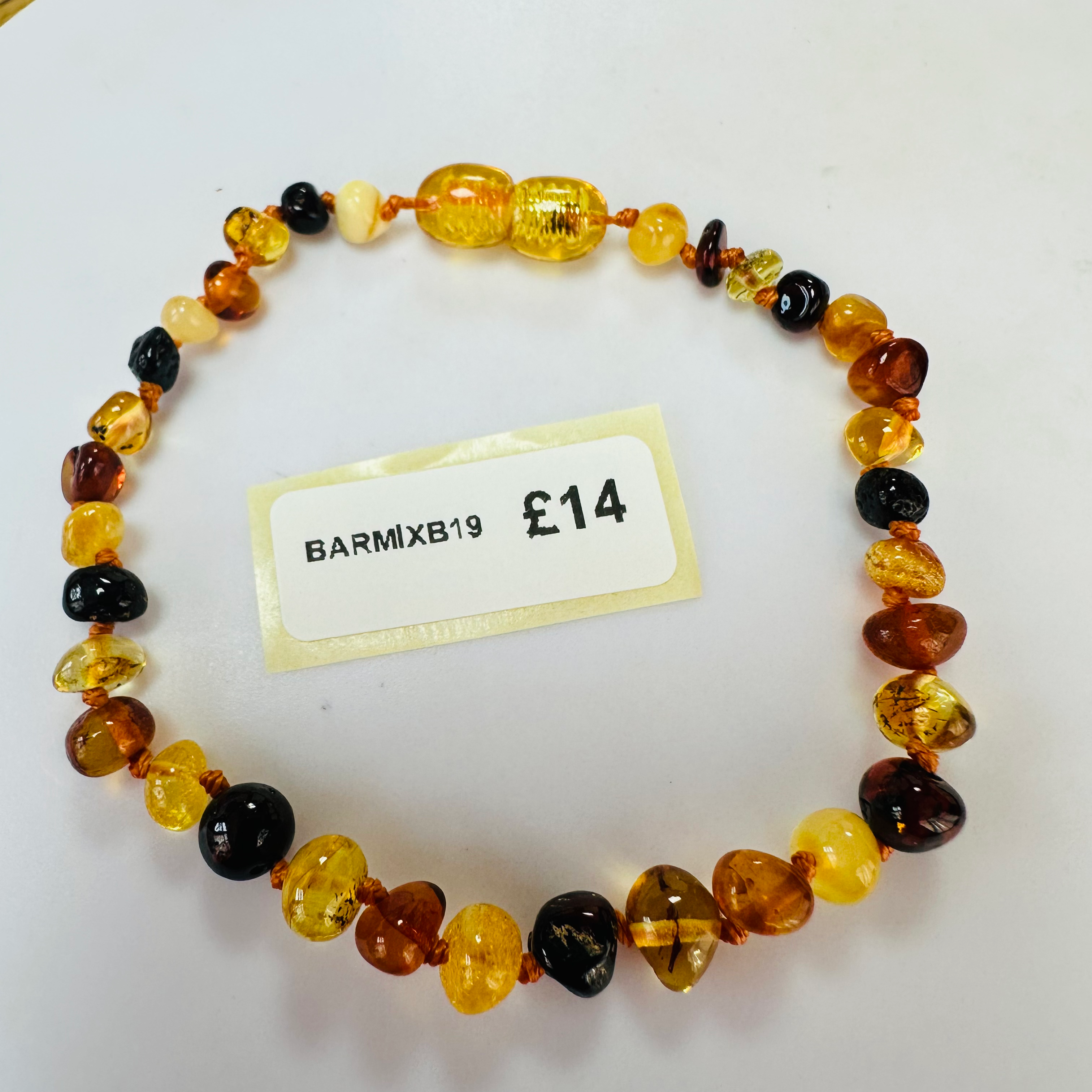 New Amber multi coloured knotted bracelet 8 inch