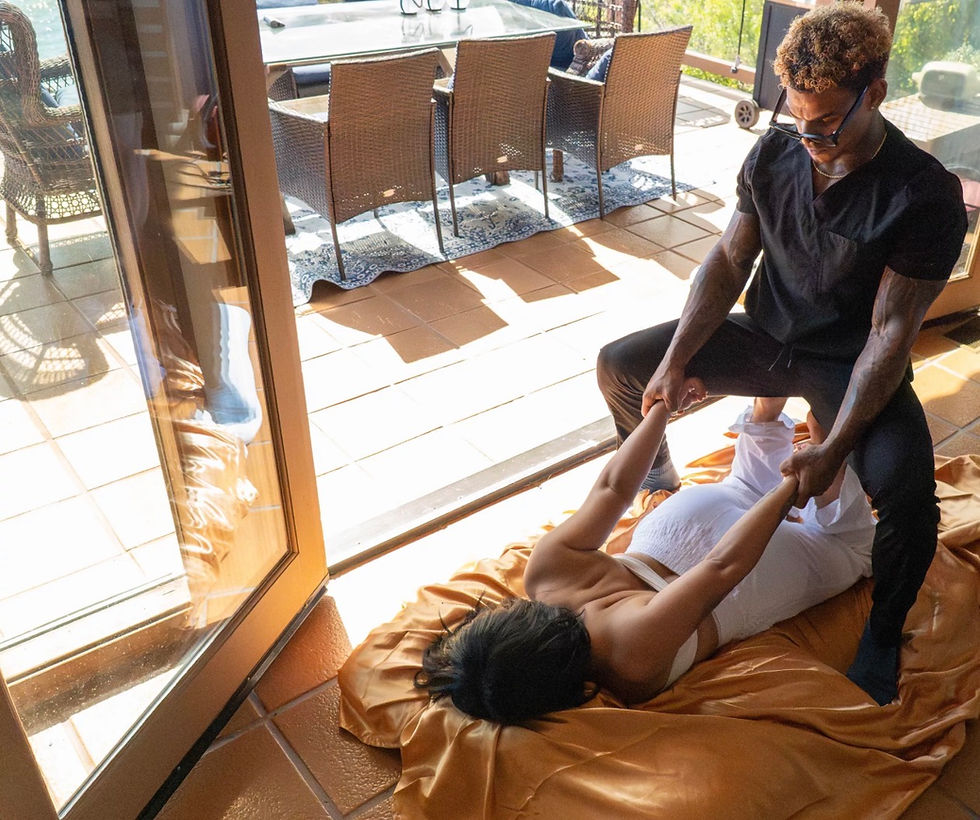 Close-up view of a massage therapist applying pressure on a client's back
