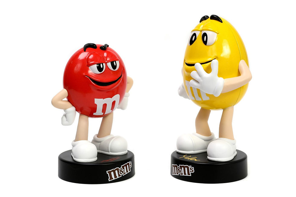 Miniatură: JADA FIGURINA METALICA M&M GALBENA 10CM