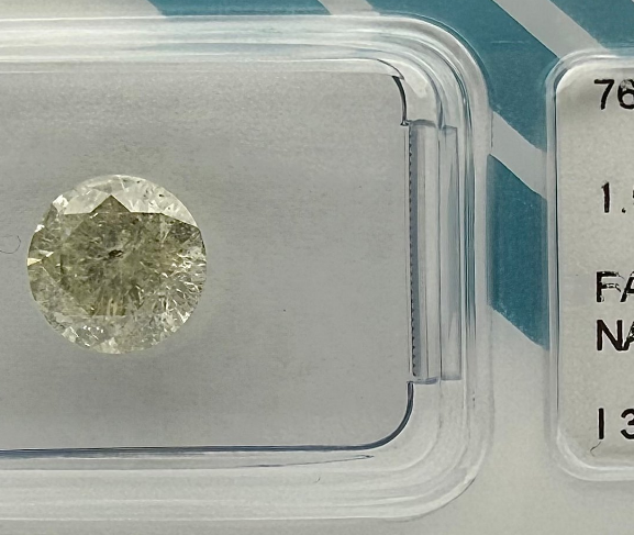 Miniaturbild: Fancy Light Yellow, 1.5ct, Rund, I3, IGI Zertifiziert