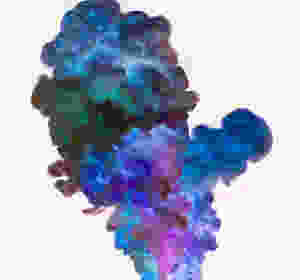 multicolored smoke rising on light pink backdrop