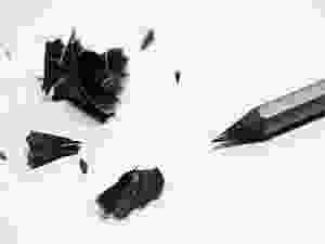 black pencil, white sheet, with shavings