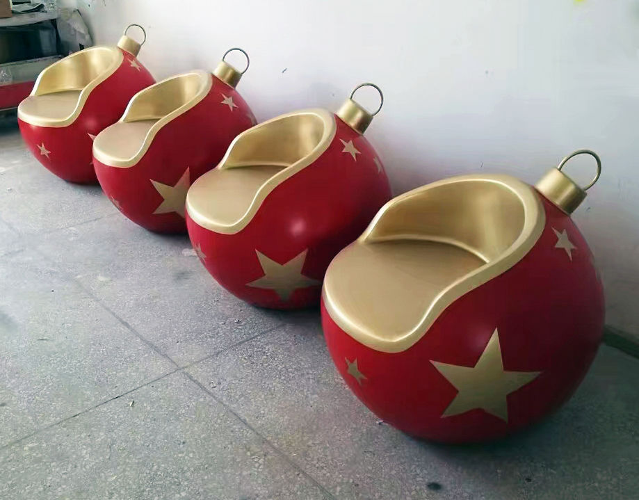 red gold fiberglass bauble chair prop