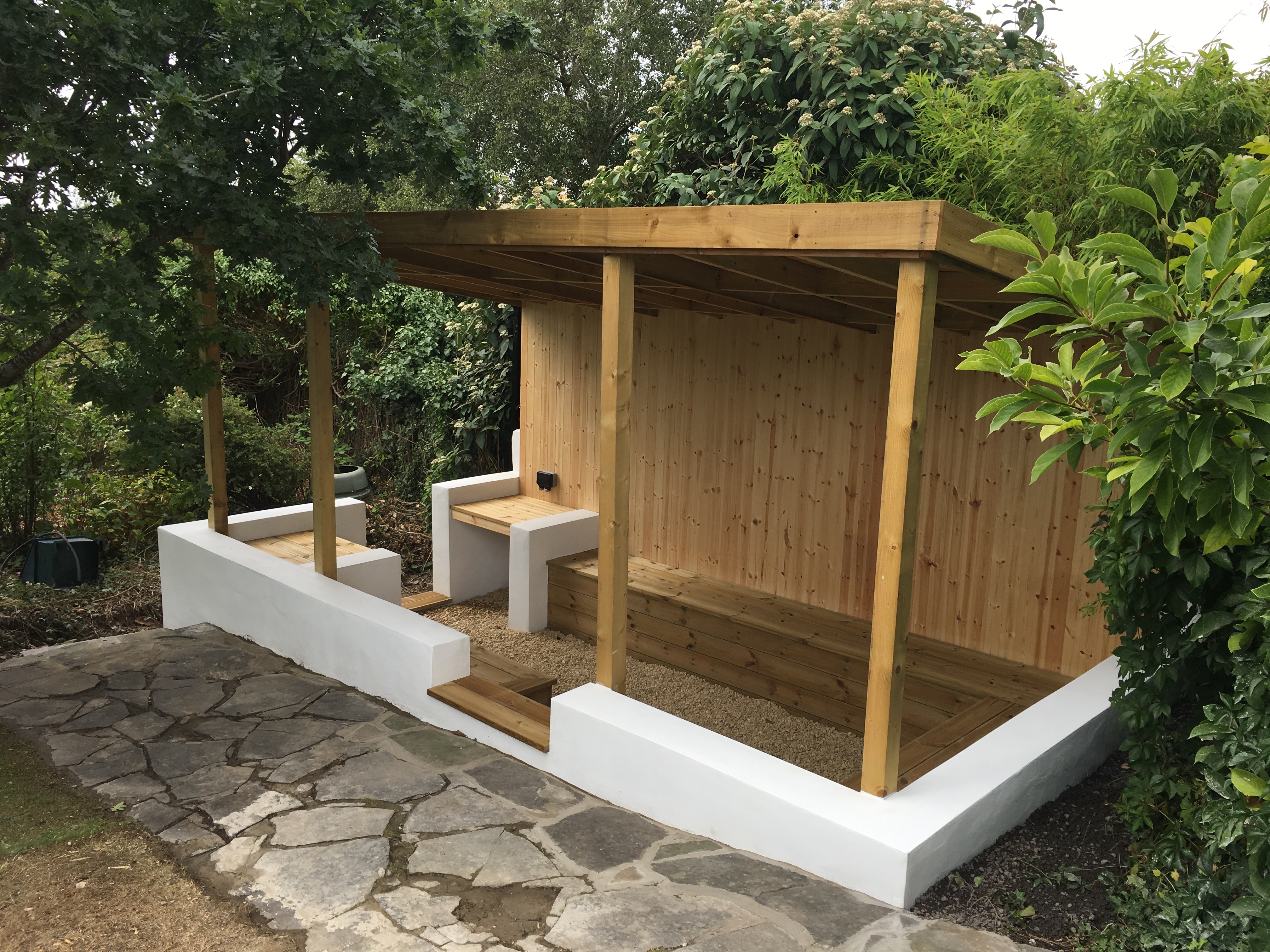 Sheltered garden seating area