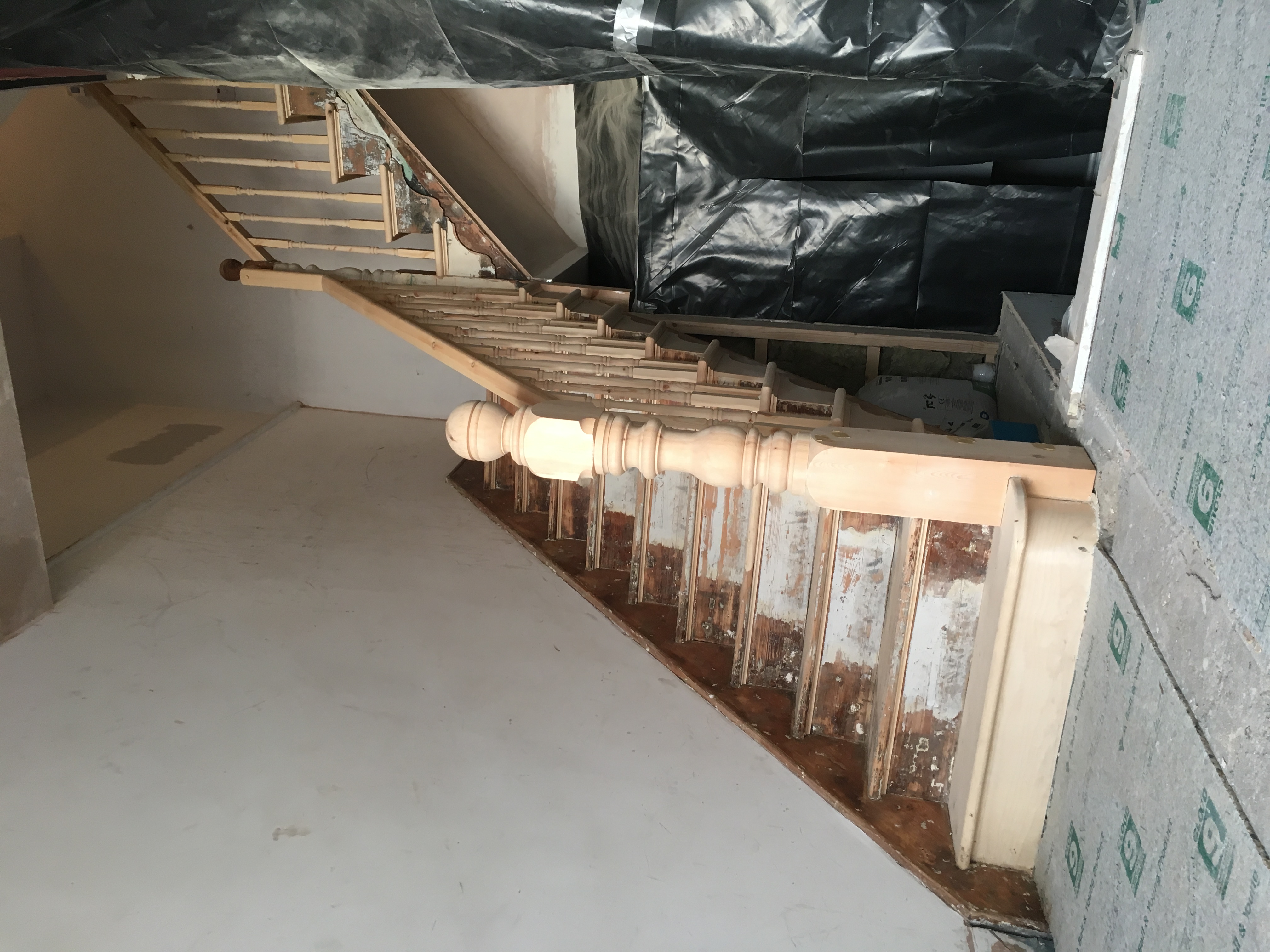 Large bespoke turned newel with refurbished stair nosing's and spindles