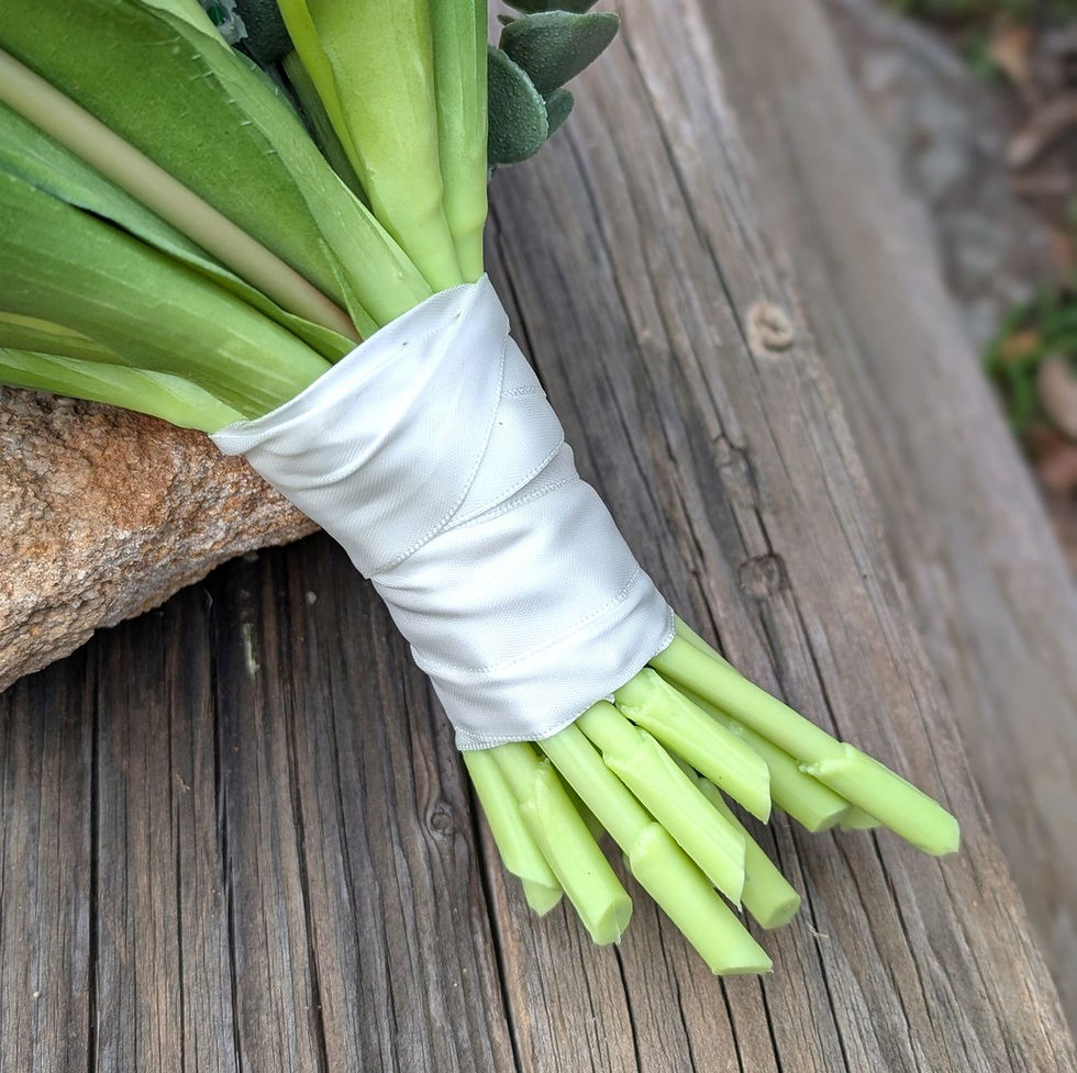 Thumbnail: Mixed pink tulip bridesmaid bouquet with soft green acacia