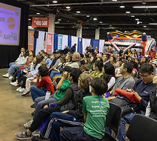 2024 YIC Young Inventor Challenge Tim Walsh on stage cropped.jpg