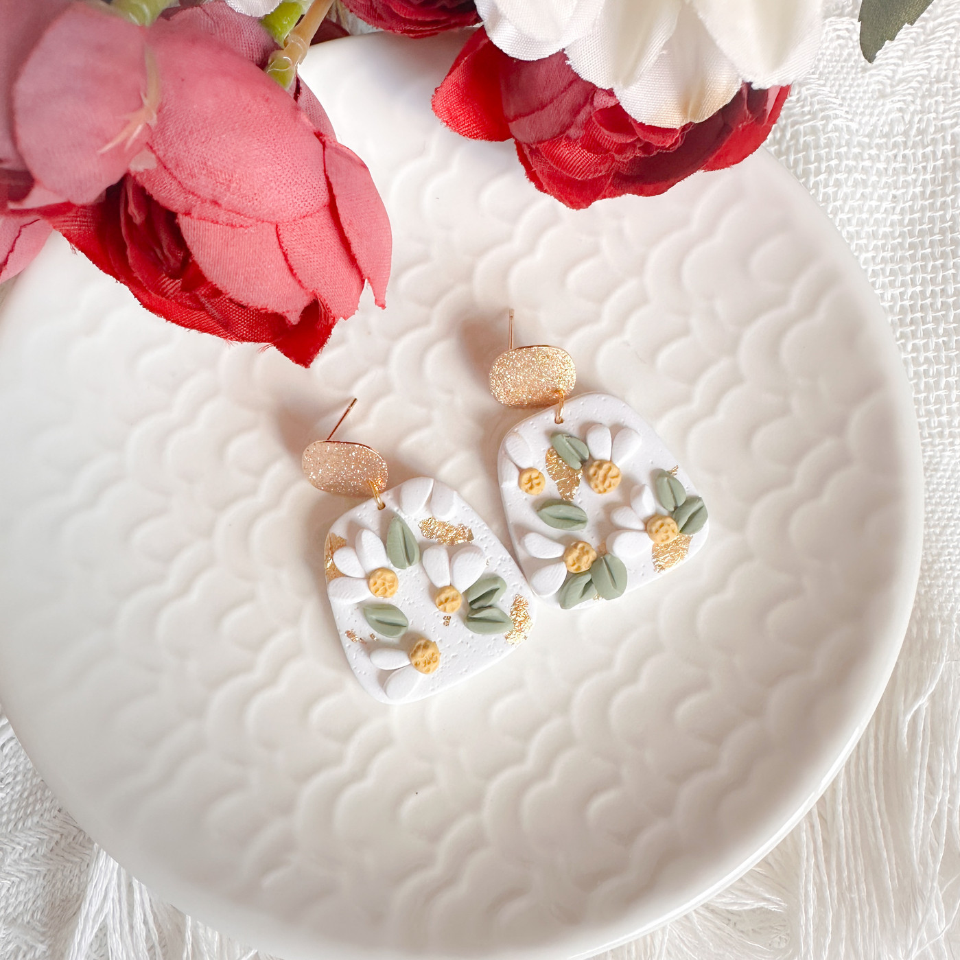 You’re a Daisy if You Do clay earrings