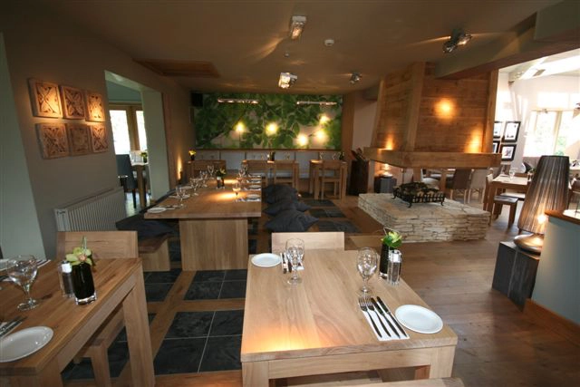 New gastropub with extensive enlargement and a hanging wooden fire.
