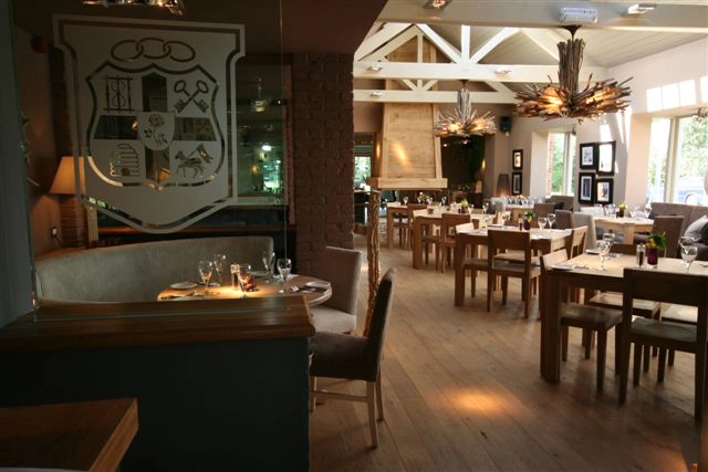 New gastropub with extensive enlargement and a hanging wooden fire.