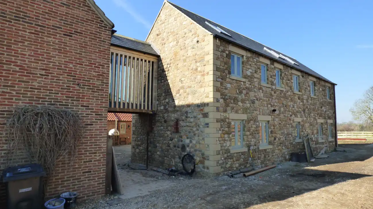 Northallerton Farmhouse New Build with a bridge link.
Phase one of major improvements to a rural site near Northallerton.  A bridge link connects the new master bedroom suite with the original house.