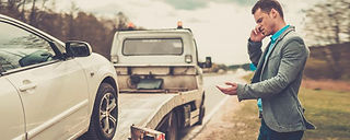 voiture sur un camion de récupération