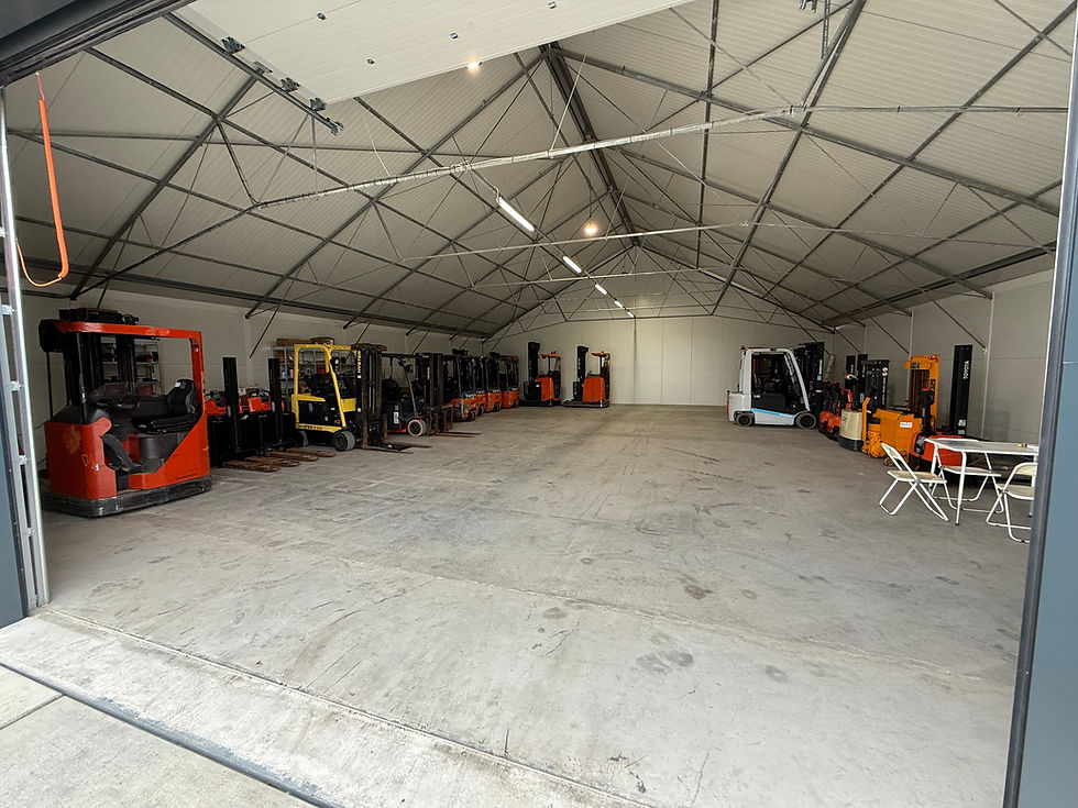 Eye-level view of a reach truck lifting a pallet in a warehouse