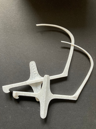 3D printed sword hilt. Printed as two parts, sliced vertically trough the centre to reduce the ammount of supports (saving time on cleaning and preping the print)