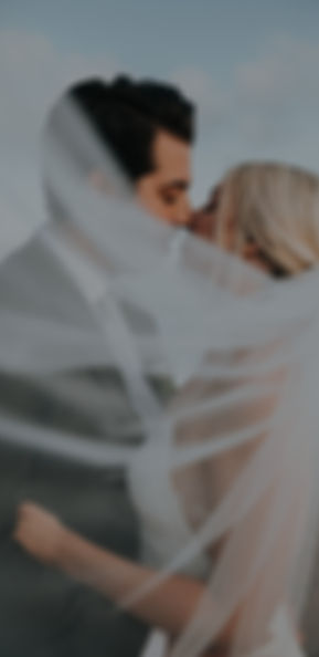 groom and bridge about to kiss during da