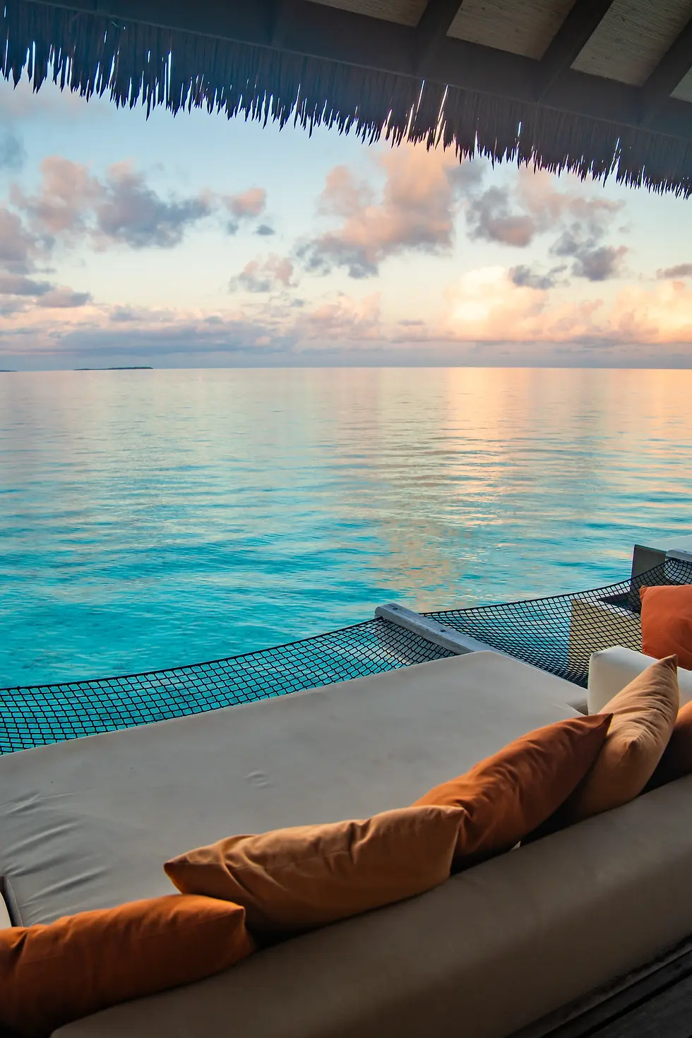 sunset-views-from-overwater-pool-villa-maldives.webp